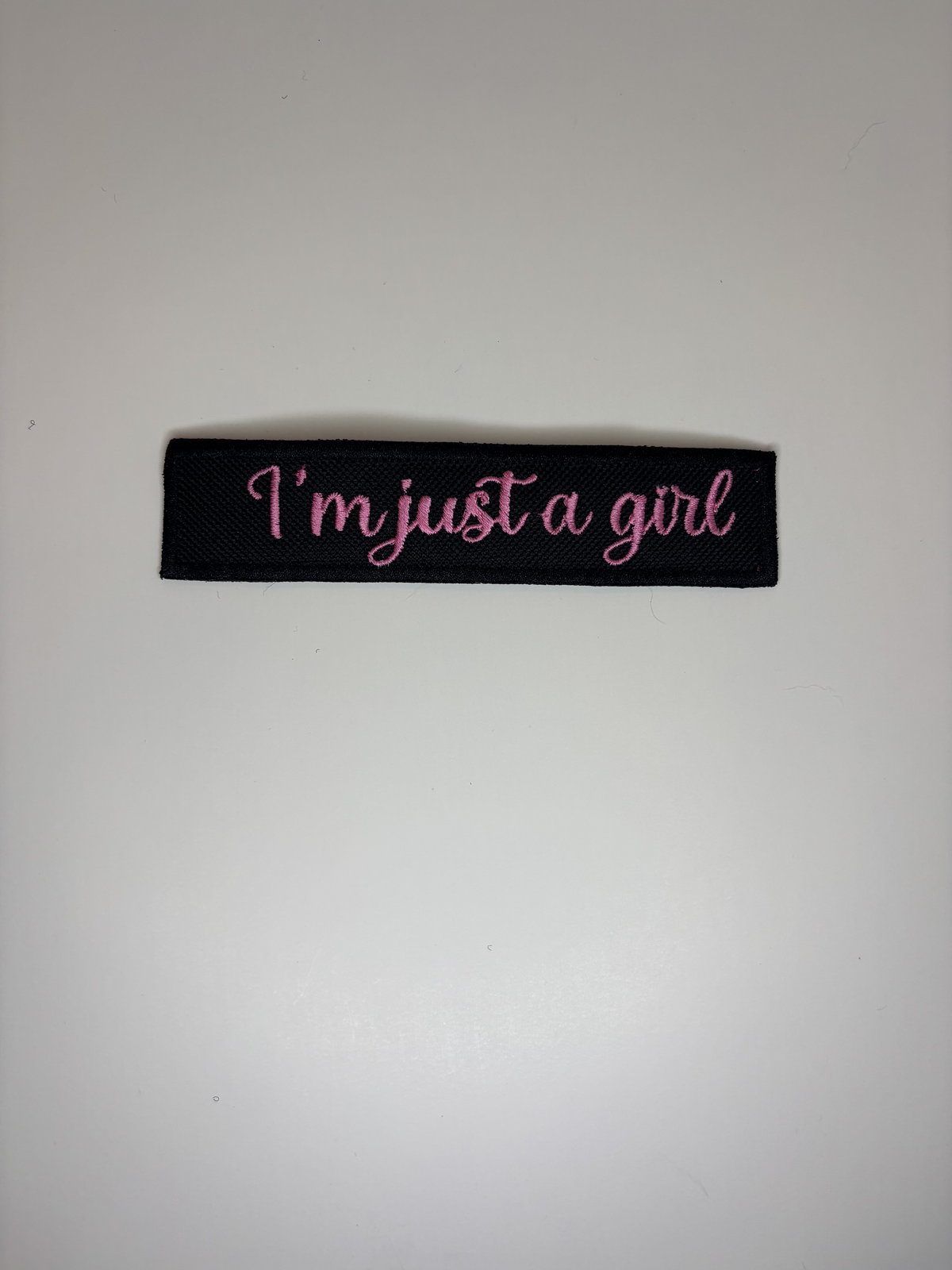 I'm Just A Girl Embroidered Flight Tag