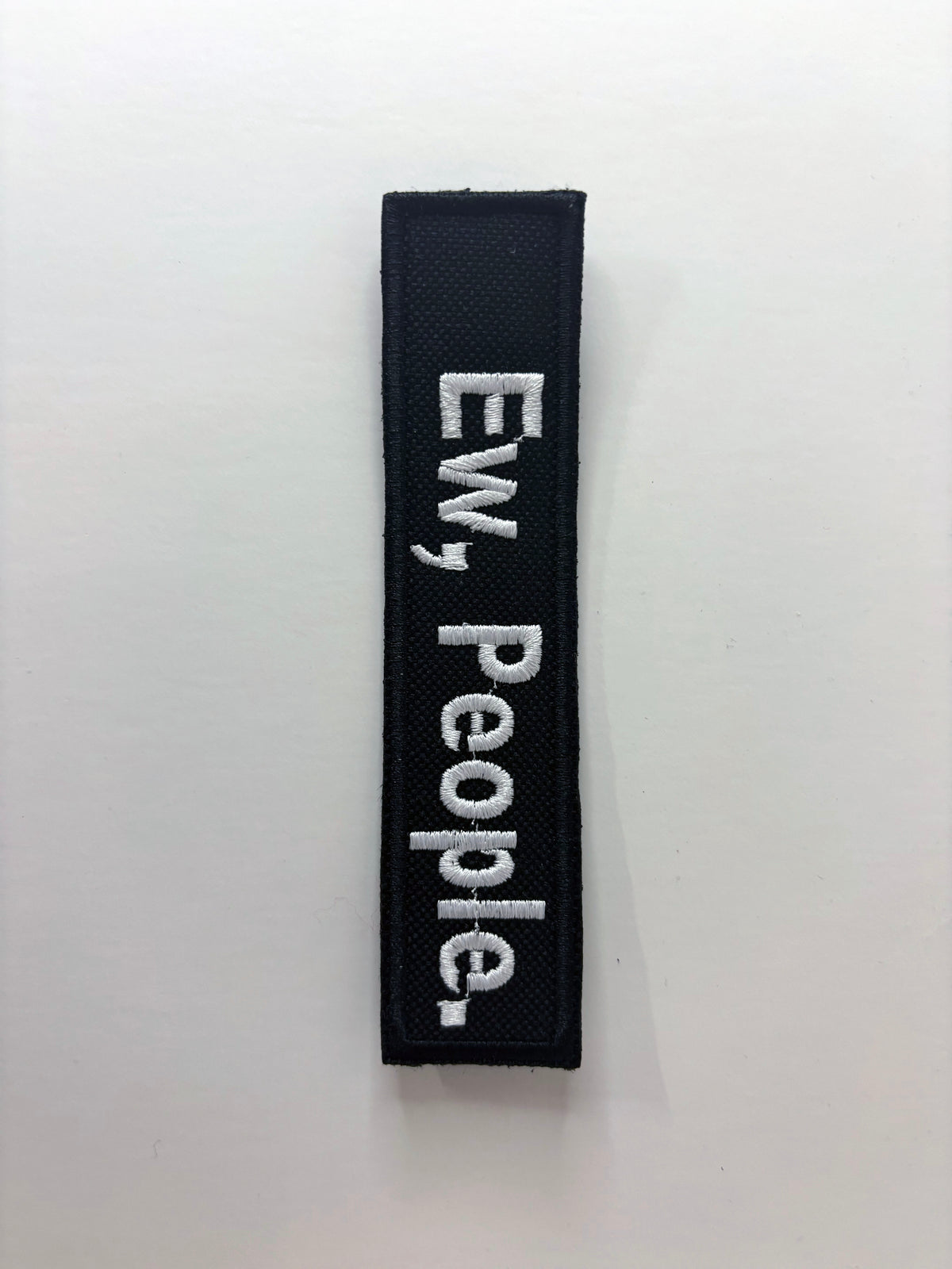 Ew People. Embroidered Flight Tag