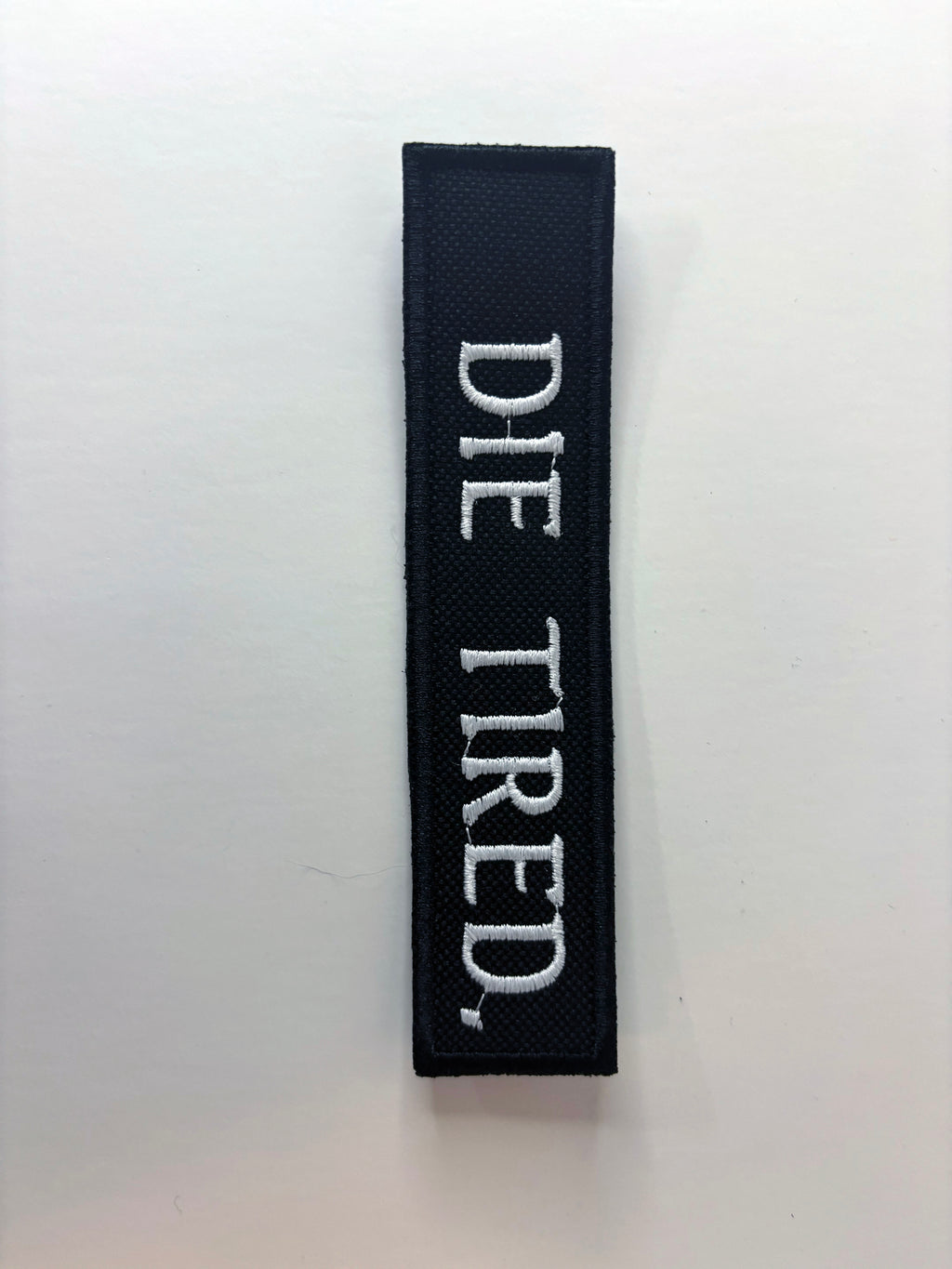 DIE TIRED. Embroidered Flight Tag