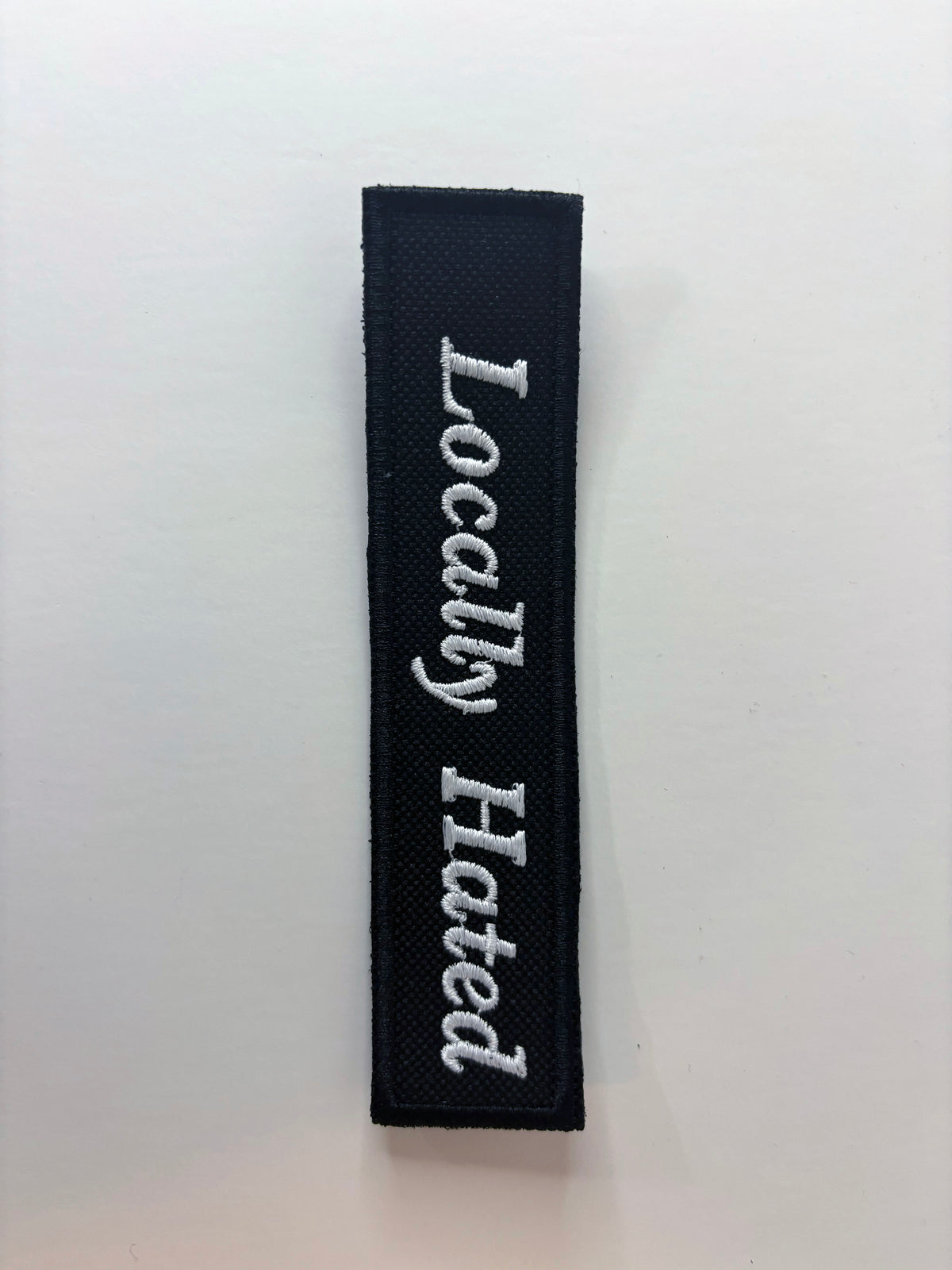 Locally Hated Embroidered Flight Tag