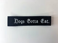 Dogs Gotta Eat. Embroidered Flight Tag