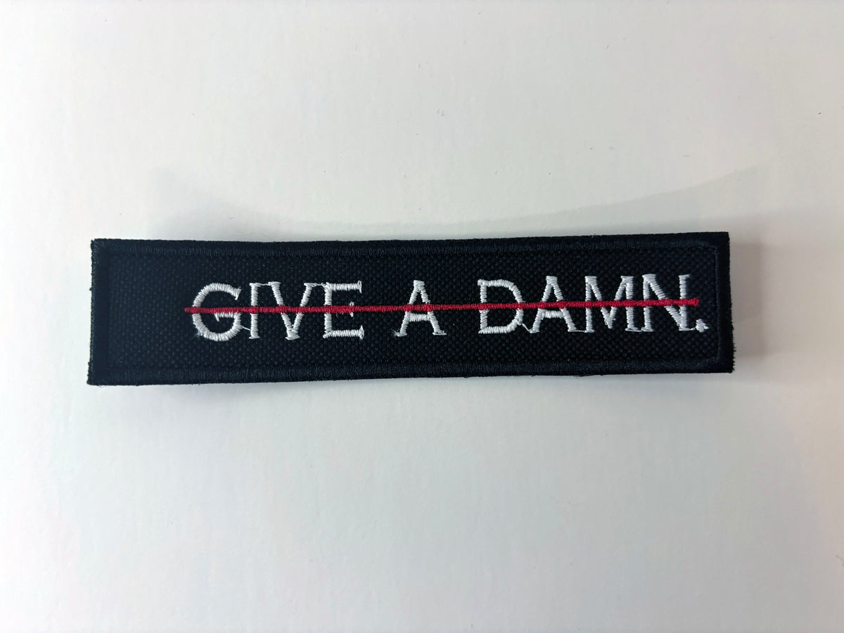 Give A Damn. Embroidered Flight Tag